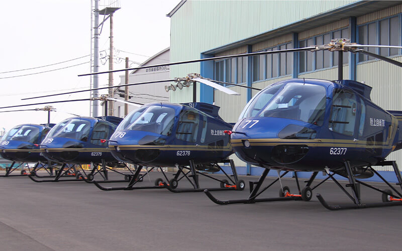 Enstrom military helicopters lined-up